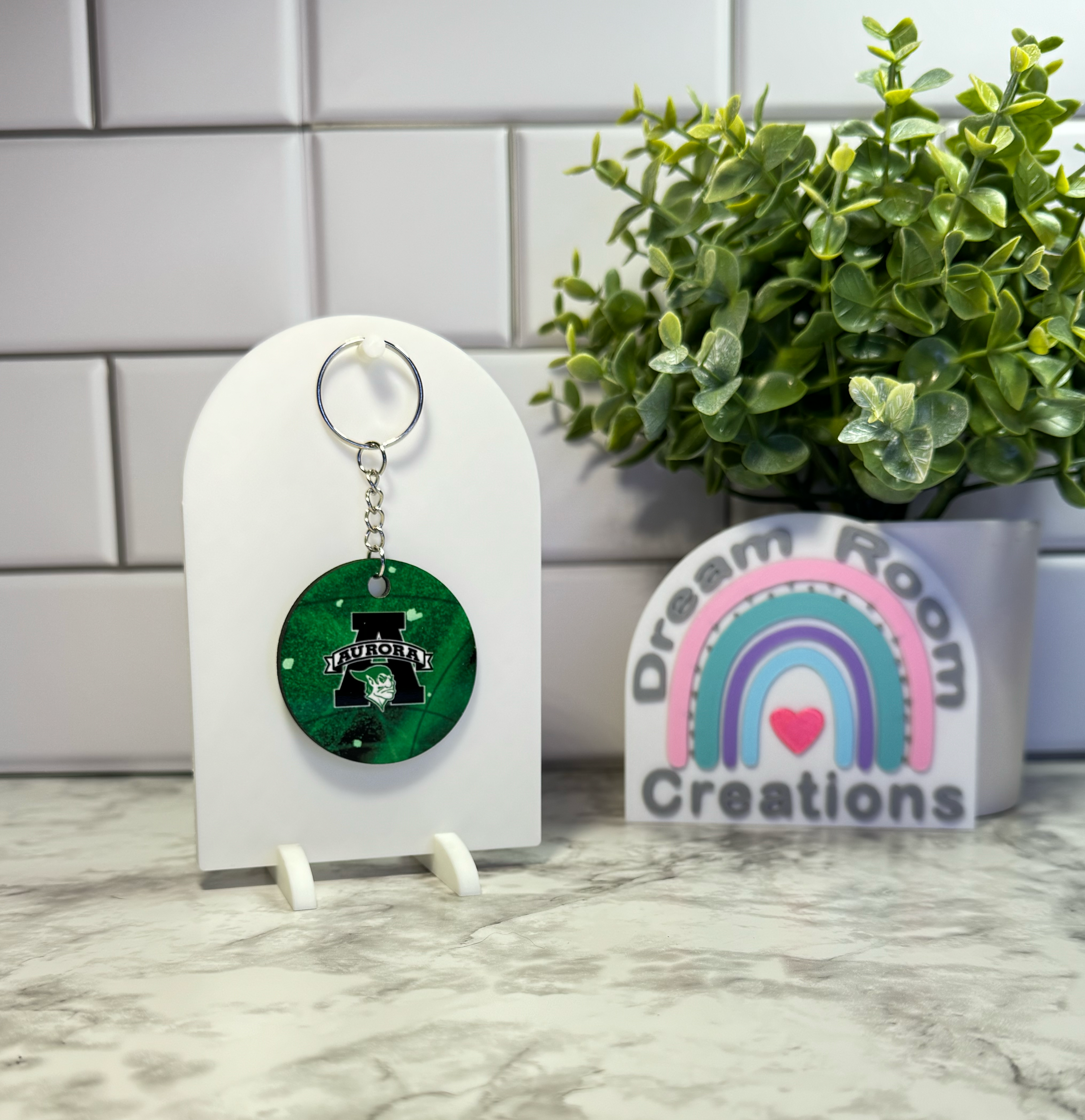 Aurora Double Sided Round Green Keychain